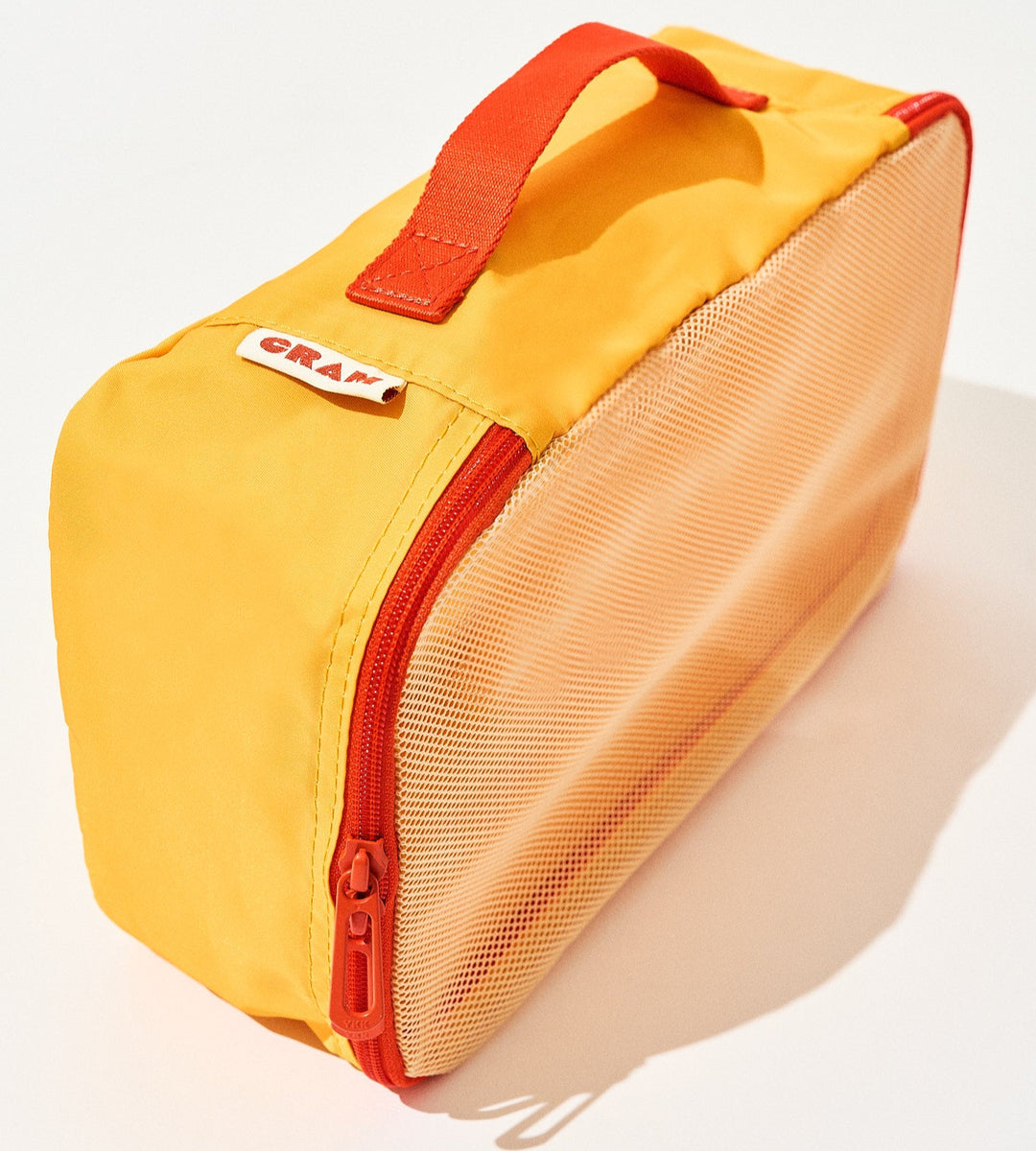 Sunrise yellow Cram packing cube suitcase organizer standing upright