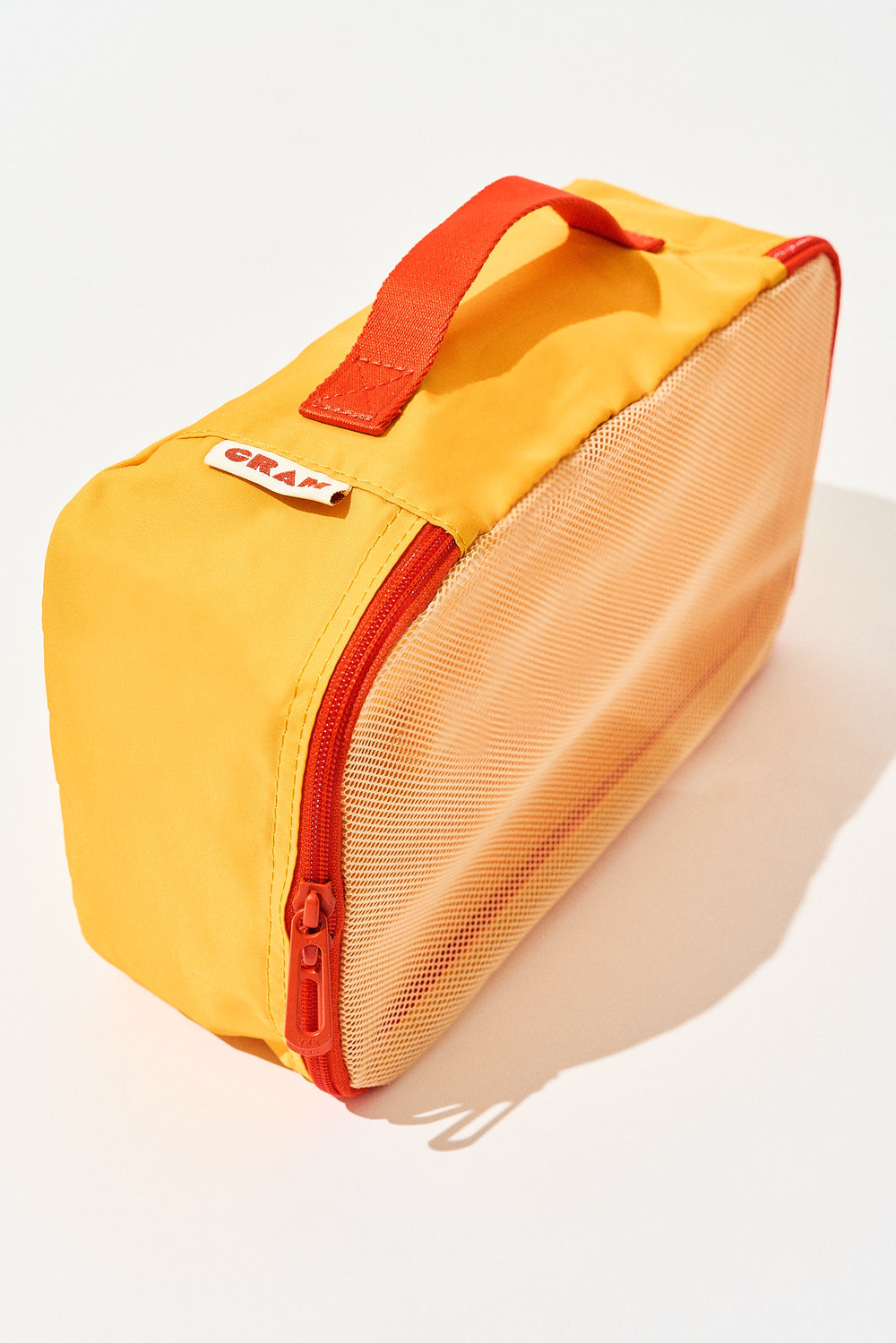 Sunrise yellow Cram packing cube suitcase organizer standing upright