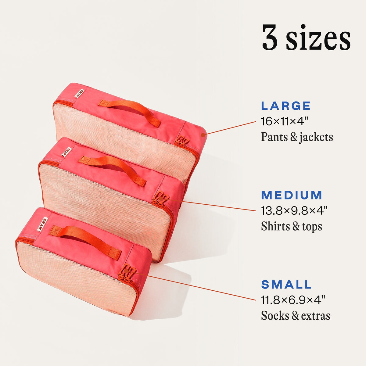Bloom pink Cram packing cube sizes: large 16 x 11 x 4 inches for pants and jackets, medium 13.8 x 9.8 x 4 inches for shirts and tops, small 11.8 x 6.9 x 4 inches for socks and extras