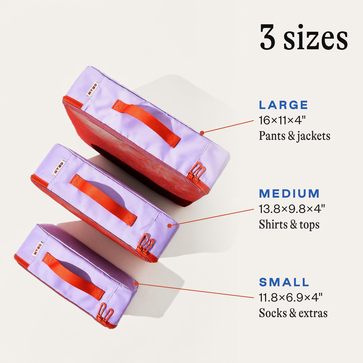 Twilight purple Cram packing cube sizes: large 16 x 11 x 4 inches for pants and jackets, medium 13.8 x 9.8 x 4 inches for shirts and tops, small 11.8 x 6.9 x 4 inches for socks and extras